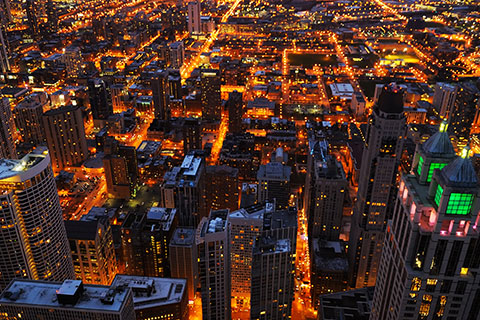 This is a stock photo. A city overview of Chicago, Illinois at night.