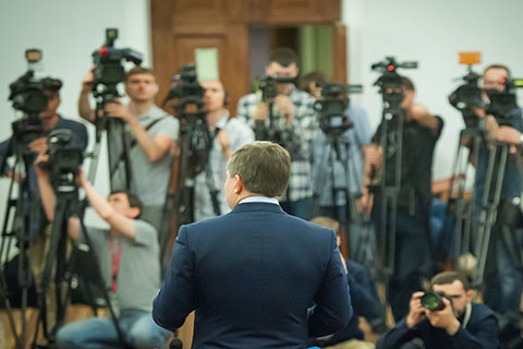 This is a stock photo of a press conference.